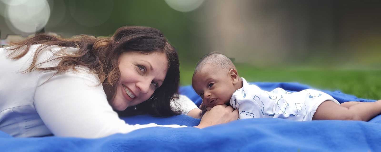 International Occupational Therapist Speaker Dr. Barbra Katerberg with baby in Tesmesgan